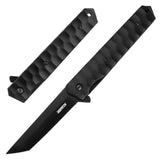 A black folding pocket knife with a stainless steel blade and textured handle, placed on a wooden surface.